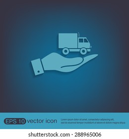 hand holding a Truck. Logistic icon. Transportation symbol. symbol icon laden truck. carriage of the goods or things