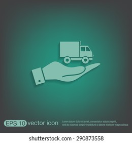 hand holding a Truck. Logistic icon. Transportation symbol. symbol icon laden truck. carriage of the goods or things