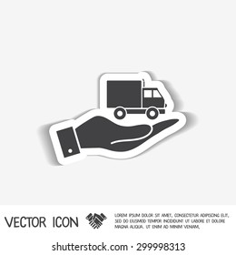 hand holding a Truck. Logistic icon. Transportation symbol. symbol icon laden truck. carriage of the goods or things