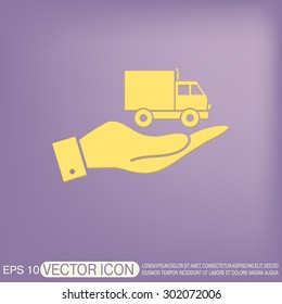 hand holding a Truck. Logistic icon. Transportation symbol. symbol icon laden truck. carriage of the goods or things