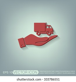 hand holding a Truck. Logistic icon. Transportation symbol. symbol icon laden truck. carriage of the goods or things