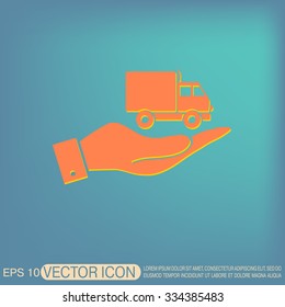 hand holding a Truck. Logistic icon. Transportation symbol. symbol icon laden truck. carriage of the goods or things