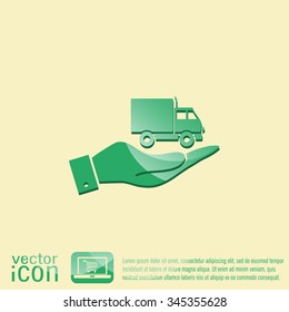 hand holding a Truck. Logistic icon. Transportation symbol. symbol icon laden truck. carriage of the goods or things