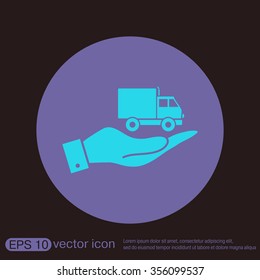 hand holding a Truck. Logistic icon. Transportation symbol. symbol icon laden truck. carriage of the goods or things