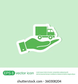 hand holding a Truck. Logistic icon. Transportation symbol. symbol icon laden truck. carriage of the goods or things