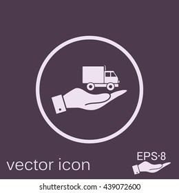 hand holding a Truck. Logistic icon. Transportation symbol. symbol icon laden truck. carriage of the goods or things