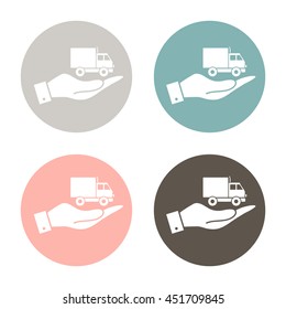 hand holding a Truck. Logistic icon. Transportation symbol. symbol icon laden truck. carriage of the goods or things