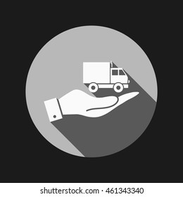 hand holding a Truck. Logistic icon. Transportation symbol. symbol icon laden truck. carriage of the goods or things