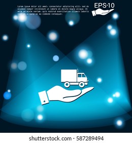 hand holding a Truck. Logistic icon. Transportation symbol. symbol icon laden truck. carriage of the goods or things