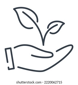 The hand holding twig or sprout with leaves.  The concept of cultivation and conservation of the environment.