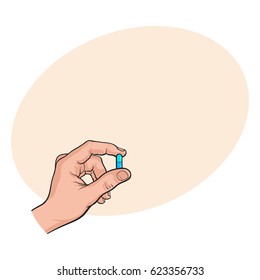 Hand holding two piece blue gelatin capsule by two fingers, side view sketch style vector illustration with space for tex. Drawing of hand holding pill, capsule, medicine by two fingers