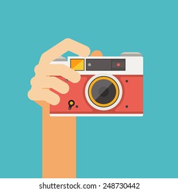 hand holding vintage camera