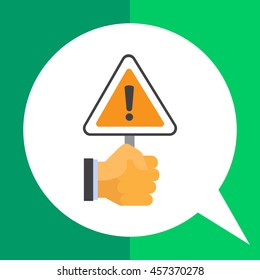 Hand holding warning sign