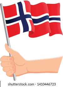 Hand holding and waving the national flag of Norway. Fans, independence day, patriotic concept. Vector illustration, eps 10.