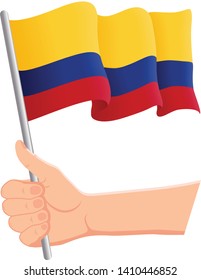 Hand holding and waving the national flag of Colombia. Fans, independence day, patriotic concept. Vector illustration, eps 10.