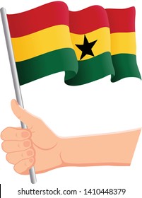 Hand holding and waving the national flag of Ghana. Fans, independence day, patriotic concept. Vector illustration, eps 10.