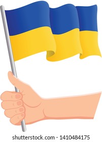Hand holding and waving the national flag of Ukraine. Fans, independence day, patriotic concept. Vector illustration, eps 10.