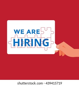 Hand holding WE ARE HIRING message. Hire announce on the bubble speech. Cartoon Vector Illustration.