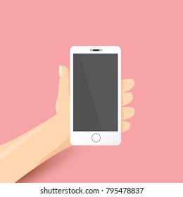 Hand holding white smart phone with blank touch screen isolated on pink background. Vector flat style design phone with blank screen and human hand