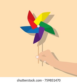 Hand holding a windmill, vector illustration design. Hands collection.