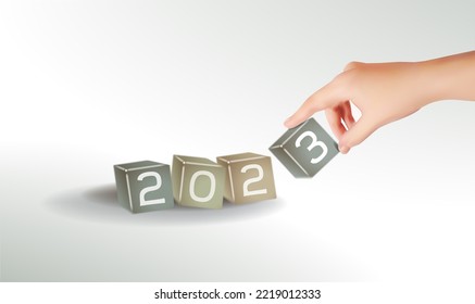 Hand holding wooden lollipop blocks with numbers 2023 put one after the other. The beginning of new year, Christmas Eve. New Year coming concept, Date 2022 changes to 2023 holiday. Xmas vector concept