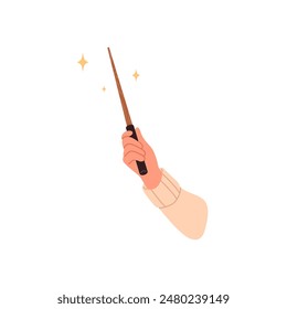 Hand holding a wooden magic wand