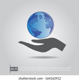 Hand holding the world vector icon