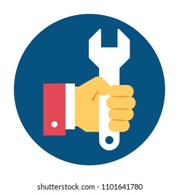 Hand holding wrench