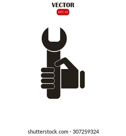 hand holding a wrench icon. Vector illustration