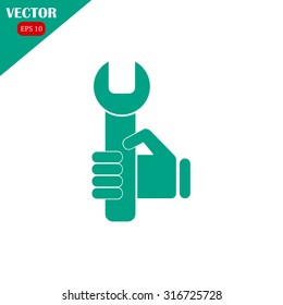 hand holding a wrench icon. Vector illustration
