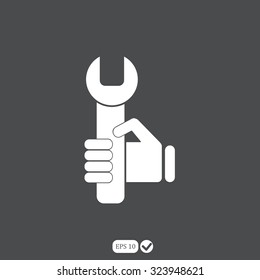 hand holding a wrench icon. Vector illustration