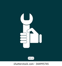 hand holding a wrench icon. Vector illustration