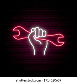 Hand holding wrench neon sign. 1st may, Labor Day neon signboard. Stock vector illustration.