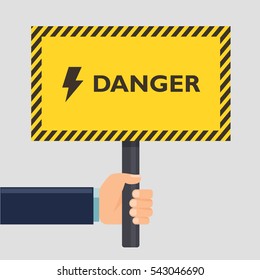 Hand holding yellow stop danger sign. Flat style design. Vector illustration.