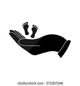 hand holds baby leg -  black vector icon