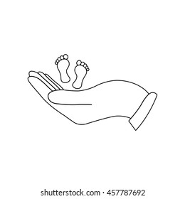hand holds baby leg  - black vector icon