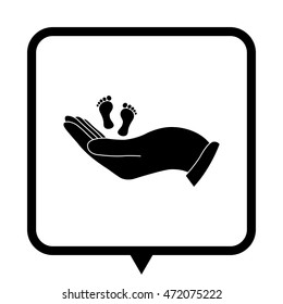 hand holds baby leg - black vector icon ; message bubble