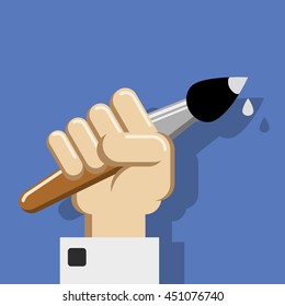 hand holds the brush