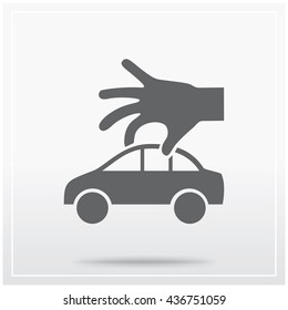 Hand holds a car. Flat icon of graphical symbol of car services and automobile sales. Vector illustration