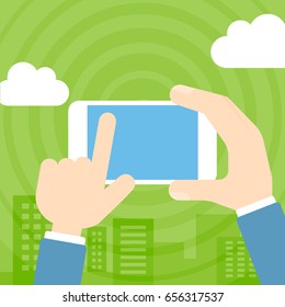 Hand holds cell phone, finger touches screen.Flat design vector illustration.