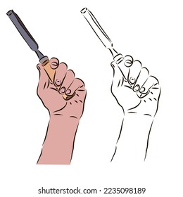 The hand holds a chisel for woodwork. The concept of the carpenter's work.