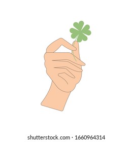 Hand holds clover. An elegant brush holds the stem of four-leaf clover in the fingers. Vector illustration, flat cartoon, eps 10. Concept: symbol of good luck, luck, St. Patrick's Day, March, spring.