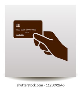 hand holds the credit card. Vector illustration on a realistic paper background with shadow. Image for adverting in the financial and the bank sphere.