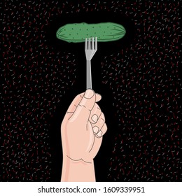 Hand holds cucumber on a fork. Black background