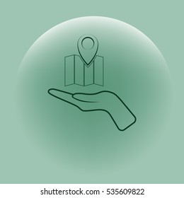 Hand holds folded paper map