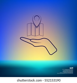 Hand holds folded paper map
