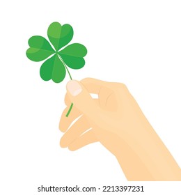 hand holds four leaf clover, symbol of good luck- vector illustration