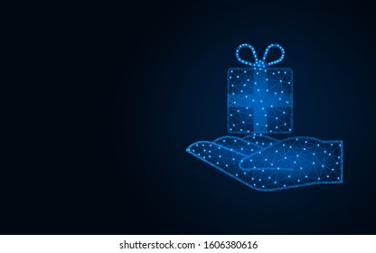 Hand holds a gift low poly design, present wireframe mesh polygonal vector illustration made from points and lines on dark blue background