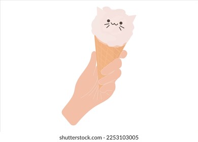 A hand holds an ice cream cone. Ice cream in the form of a cat