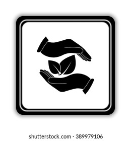 hand holds leaves  - black vector icon